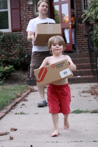 boy-moving-box-helping